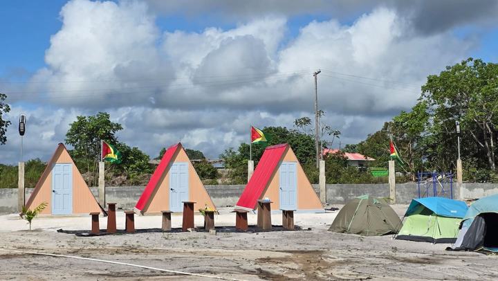 A-frames with Guyana flags flying